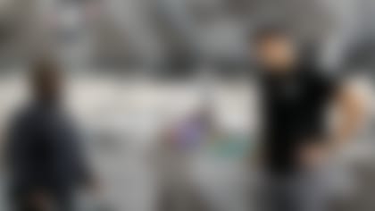 Chicago Bears tight end Jimmy Graham (80) receives the Man of The Year honor from Devices 4 The Disabled, Tuesday, October 5, 2021, in Wheeling, Illinois.