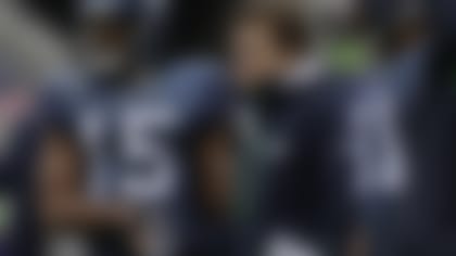 Seahawks receiver Doug Baldwin, shown shaking hands with Schneider before a 2011 game, credits Schneider as a "very open, very vulnerable" GM who "really wants you to understand where he's coming from."
