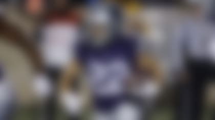 Kansas State running back Deuce Vaughn (22) rushes for yardage during the first quarter of an NCAA college football game against Kansas on Saturday, Nov. 26, 2022, in Manhattan, Kan. (AP Photo/Colin E. Braley)