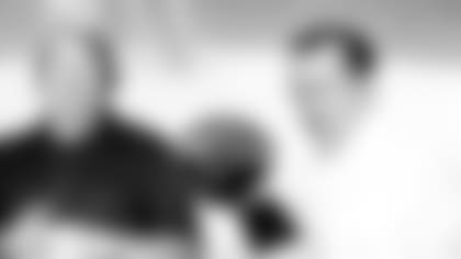 ** ADVANCE FOR WEEKEND, OCT. 4-5 - FILE ** In this Jan. 9, 1977, file photo, Oakland Raiders coach John Madden, left, and owner Al Davis talk with reporters and display the Super Bowl trophy, after the Raiders' 32-14 victory over the Minnesota Vikings in Pasadena, Calif. Aside from Madden, promoted from the assistant ranks in 1969 at age 32, Davis' overbearing manner and his penchant for coaching from the owner's box drove young coaching talen away--from Mike Shanahan to Jon Gruden to Lane Kiffin, the only one whose bona fides are not yet established. (AP Photo/files)