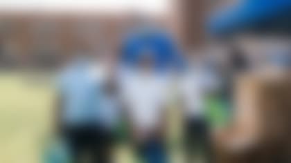 Detroit Lions fullback Jason Cabinda (45) during a School Book Giveaway at Davison Elementary School in Detroit, MI on September 7, 2021. (Jeff Nguyen/Detroit Lions)