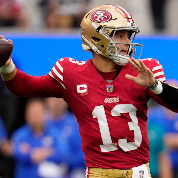 San Francisco 49ers quarterback Brock Purdy overthrows wide-open 49ers wide receiver Deebo Samuel on a deep route