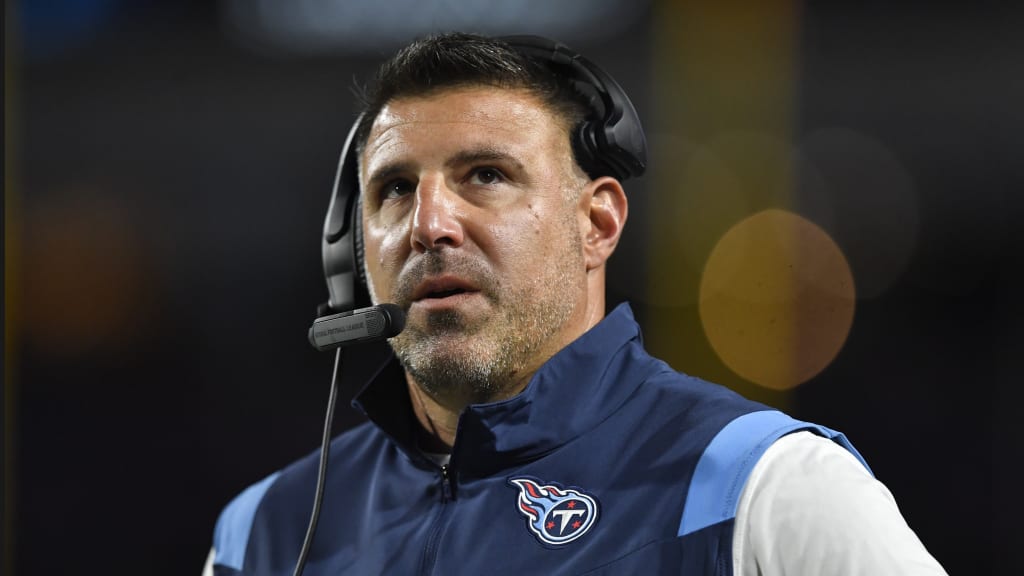 Tennessee Titans coach Mike Vrabel walks out of Friday's press