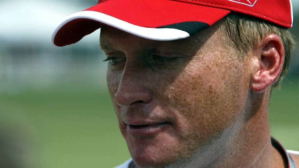 Tampa Bay Buccaneers' head coach Jon Gruden greets Denver Broncos