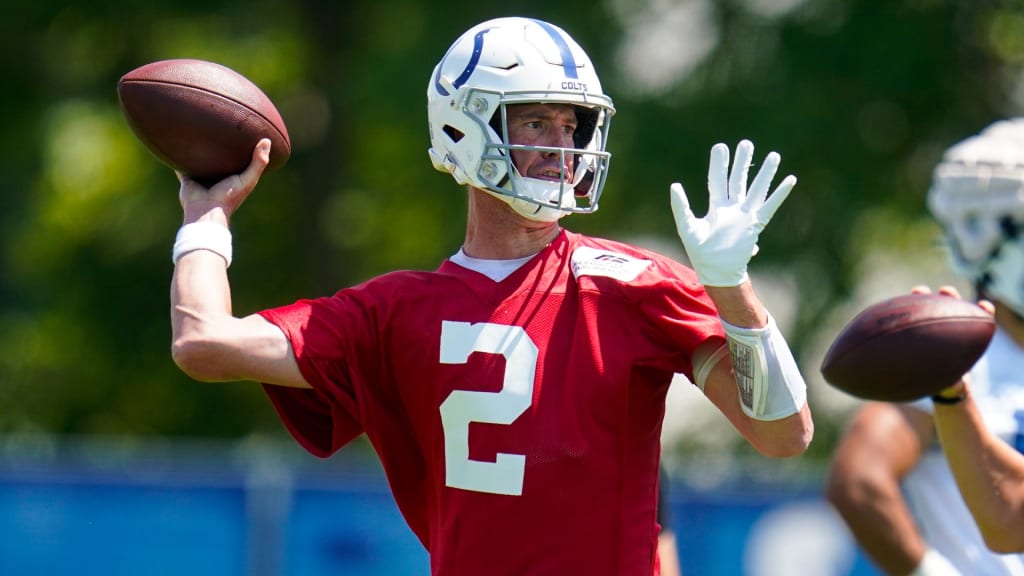 FILE - Indianapolis Colts quarterback Matt Ryan holds up his new jersey  following a press conference at the NFL team's practice facility in  Indianapolis on March 22, 2022. After four straight losing