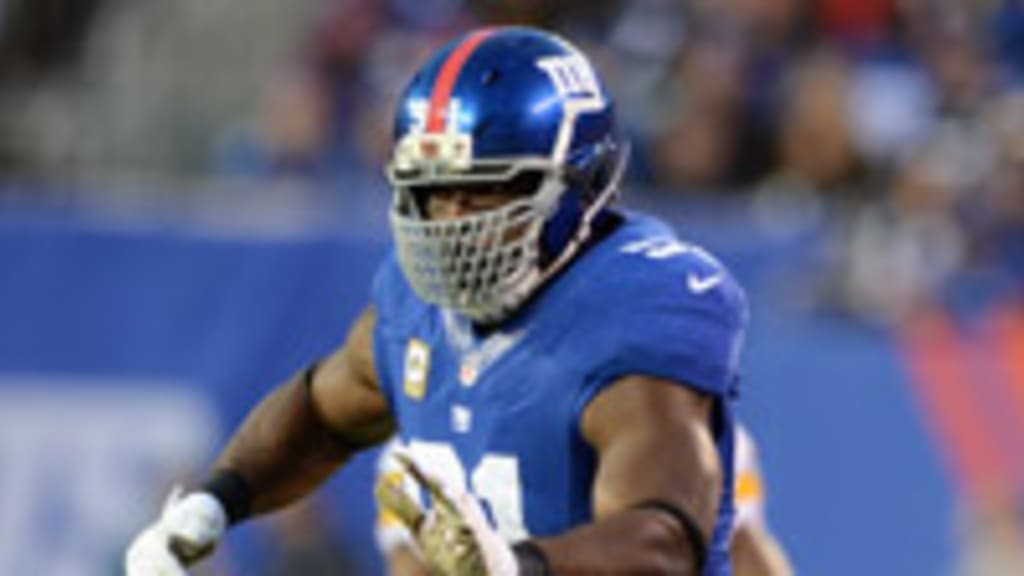 Osi Umenyiora rushes to defend Justin Tuck 