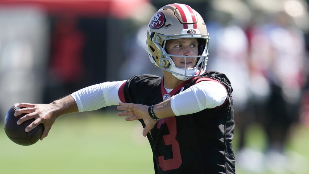 San Francisco 49ers quarterback Trey Lance throws a pitch during