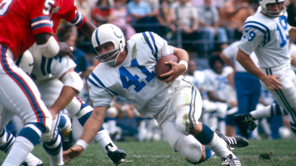 Runningback Tom Matte of the Baltimore Colts dives over the goal line