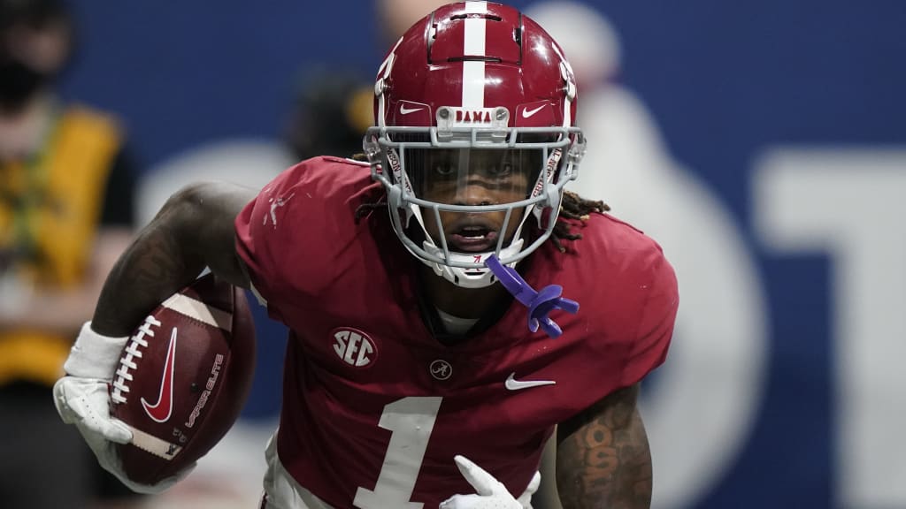 Alabama wide receiver Jameson Williams, left, at the NFL Red Carpet Stage  on Thursday, April 28 …