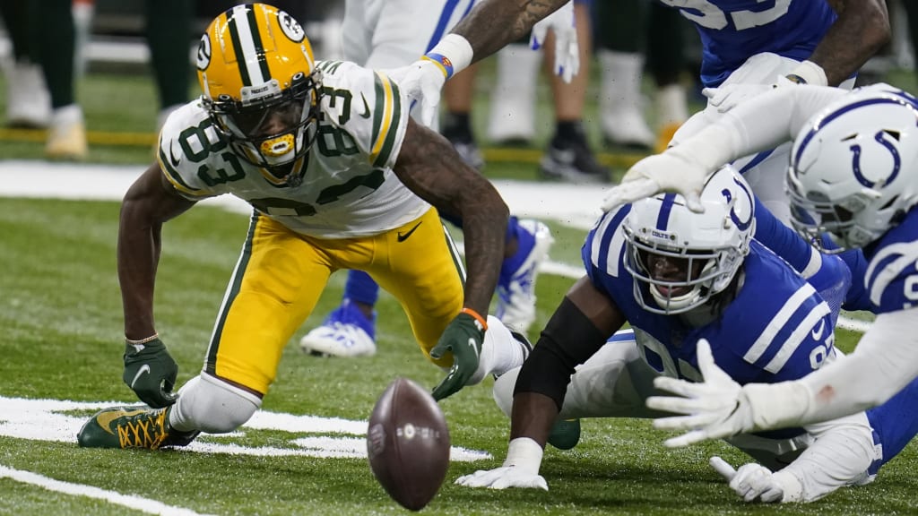 November 11, 2018: Green Bay Packers wide receiver Marquez Valdes-Scantling  #83 stiff arms Miami Dolphins cornerback Bobby McCain #28 during the NFL  Football game between the Miami Dolphins and the Green Bay