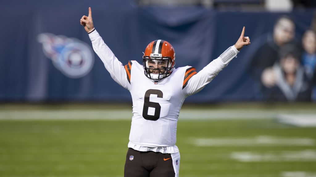 Cleveland Browns quarterback Nick Mullens (9) makes a run before throwing  the ball for a touchd …