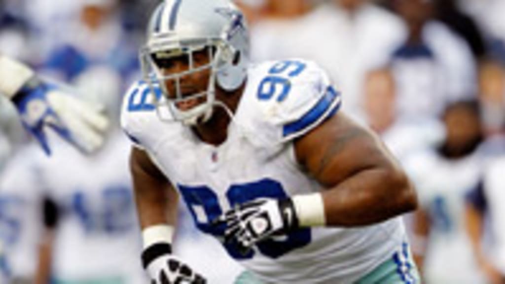 Dallas Cowboys linebacker Victor Butler tackles Miami Dolphins