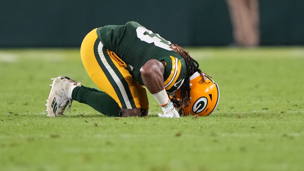 Packers running back Aaron Jones seen in walking boot following