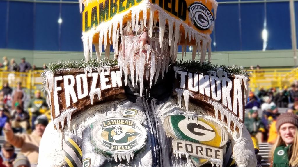 Green Bay Packers fan, Frozen Tundra Man looks on during the