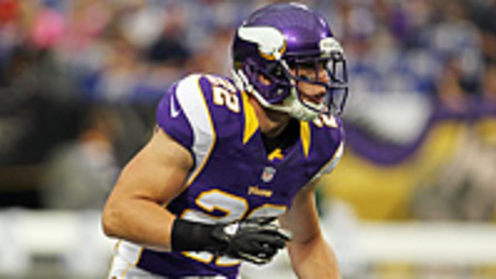 Washington Redskins quarterback Robert Griffin III (10) sprints down the  sideline for a touchdown as Minnesota Vikings free safety Harrison Smith  (22) makes a diving attempt to tackle him during the second