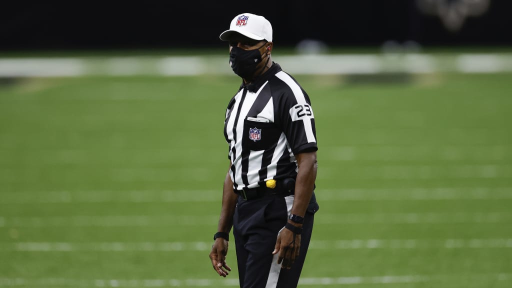 Referee Jerome Boger wears a Crucial Catch hat during an NFL football game  between the Carolina