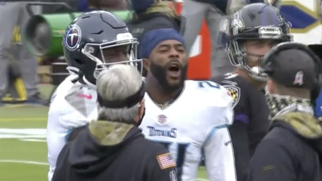 Ravens players dance on Titans' logo after fourth-quarter INT