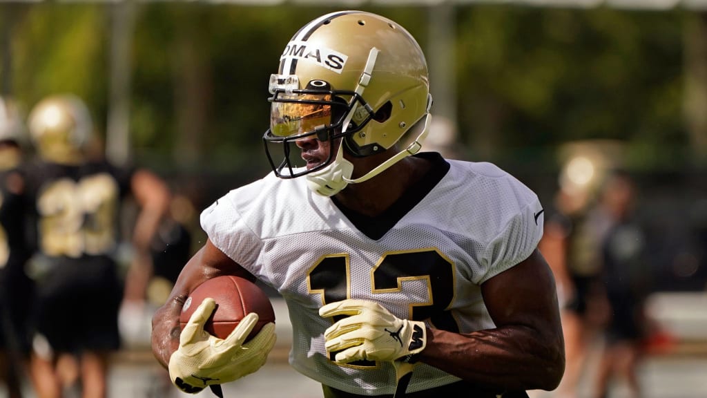 Saints' Michael Thomas returns to practice with a new deal