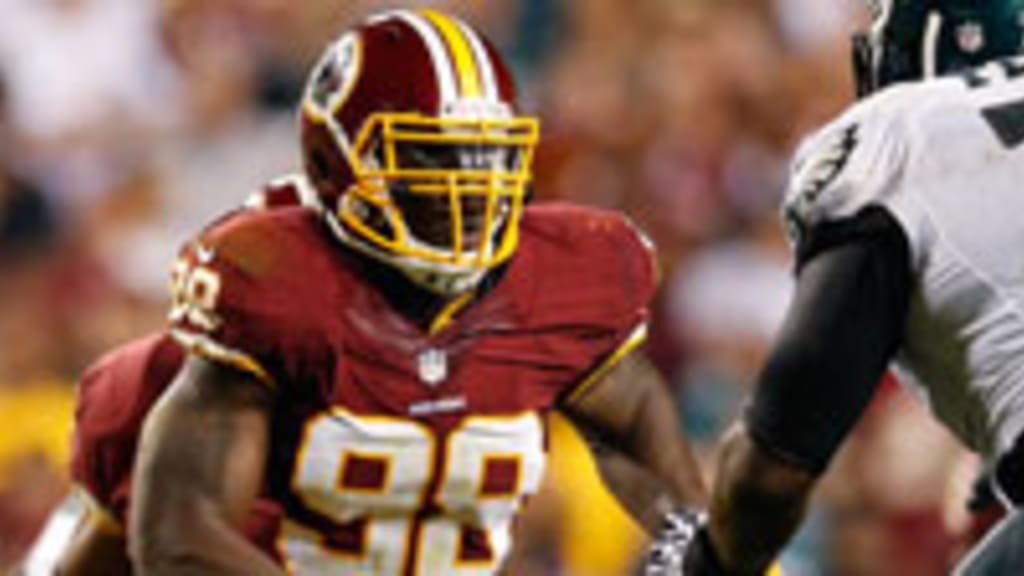 Brian Orakpo of the Washington Redskins defends against the New