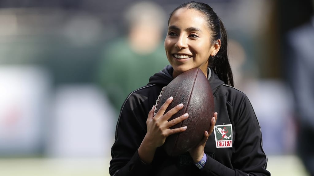 Woman becomes first flag football player with gear in Pro Football Hall of  Fame