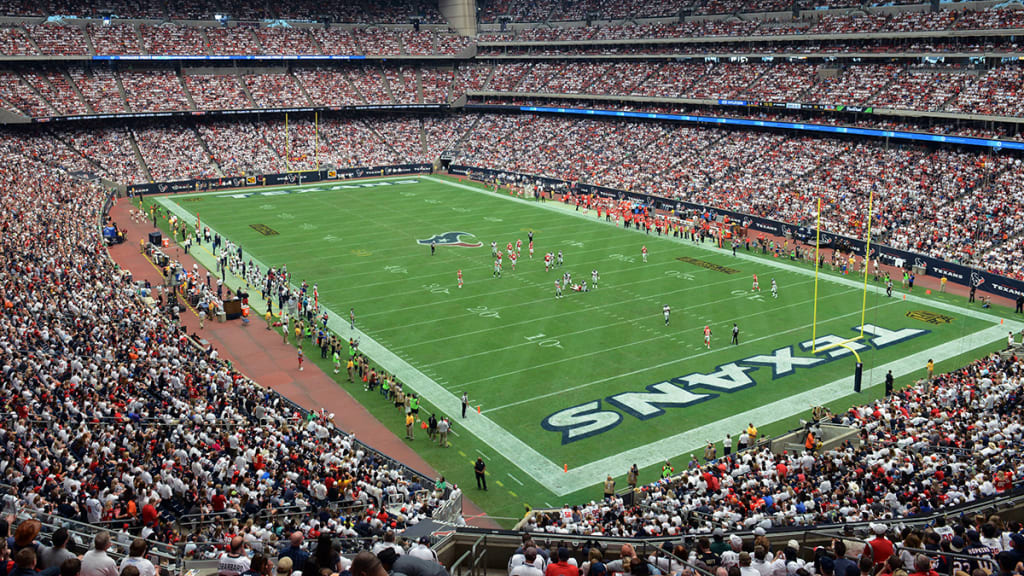 Sunlight hits the NFL logo on the field at NRG Stadium before an NFL  football game Sunday between the Houston Texans and Washington Redskins,  Sept. 7, 2014, in Houston. (AP Photo/David J.