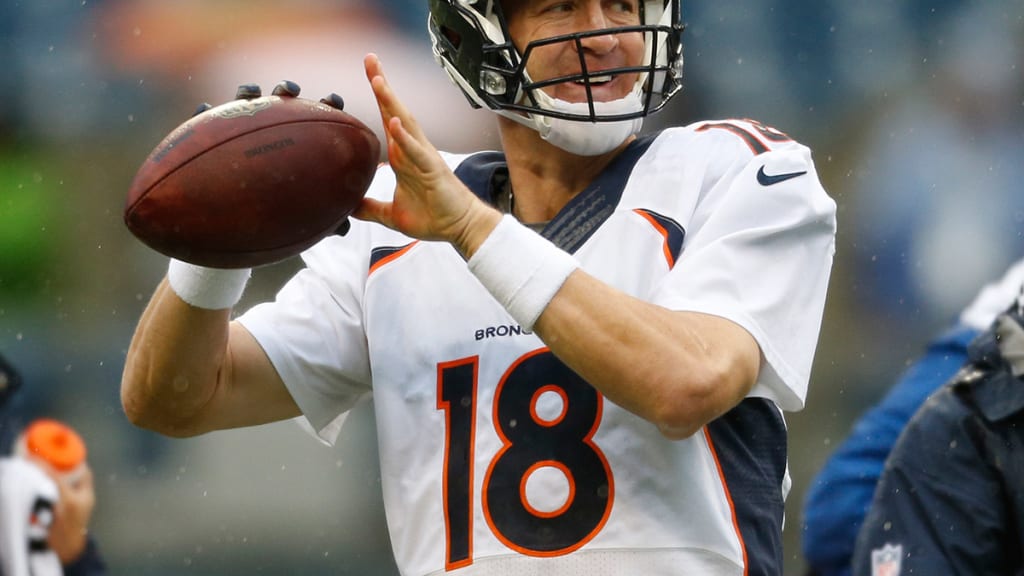 Gloves help Broncos' Peyton Manning get a grip