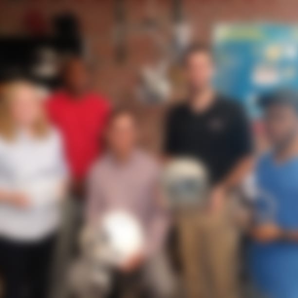 The Yobel team show off their facemask prototypes at the Center for Advanced Vehicular Systems at Mississippi State University. Pictured (from left to right) Karen Persons (Ph.D. student), Jordon Hoyer (undergraduate student), Dr. Mark Horstemeyer (Yobel President/CEO), Tate Fonville (Ph.D. student), and Xavian Boone (undergraduate student). Photo courtesy of Yobel Technologies.