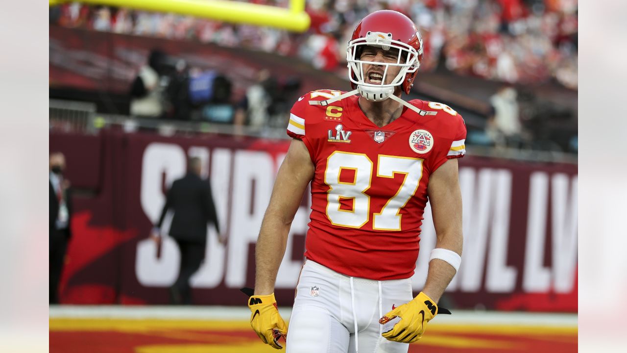 Kansas City Chiefs tight end Travis Kelce (87) holds up the Vince Lombardi  Trophy after the NFL Super Bowl 54 football game between the San Francisco  49ers and Kansas City Chiefs Sunday