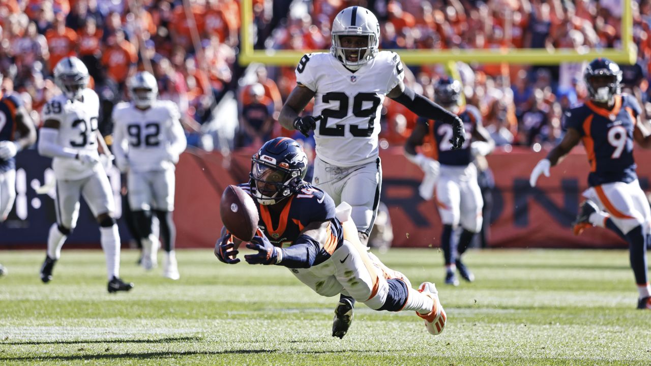 Denver Broncos wide receiver Courtland Sutton (14) is tackled by Detroit  Lions cornerback Dariu …