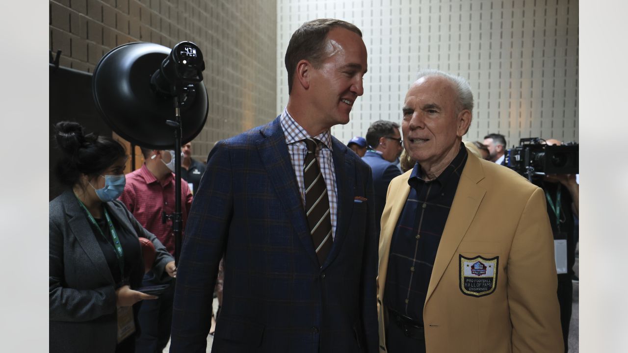 Peyton Manning, Harold Carmichael and Alan Faneca in the Hall of