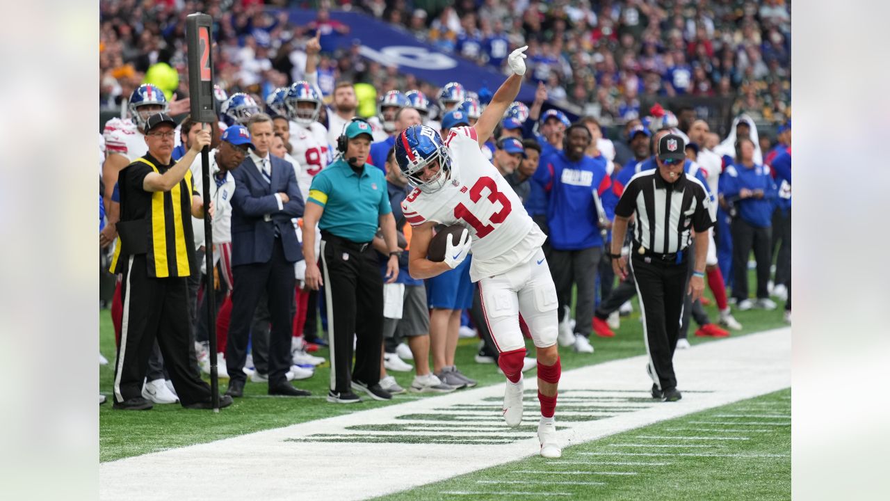 New York Giants running back Gary Brightwell (23) runs up the field during  an NFL football game against the Green Bay Packers at Tottenham Hotspur  Stadium in London, Sunday, Oct. 9, 2022.