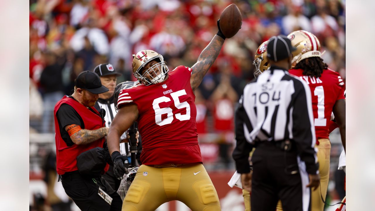 San Francisco 49ers guard Aaron Banks (65) defends in the third quarter  during an NFL football