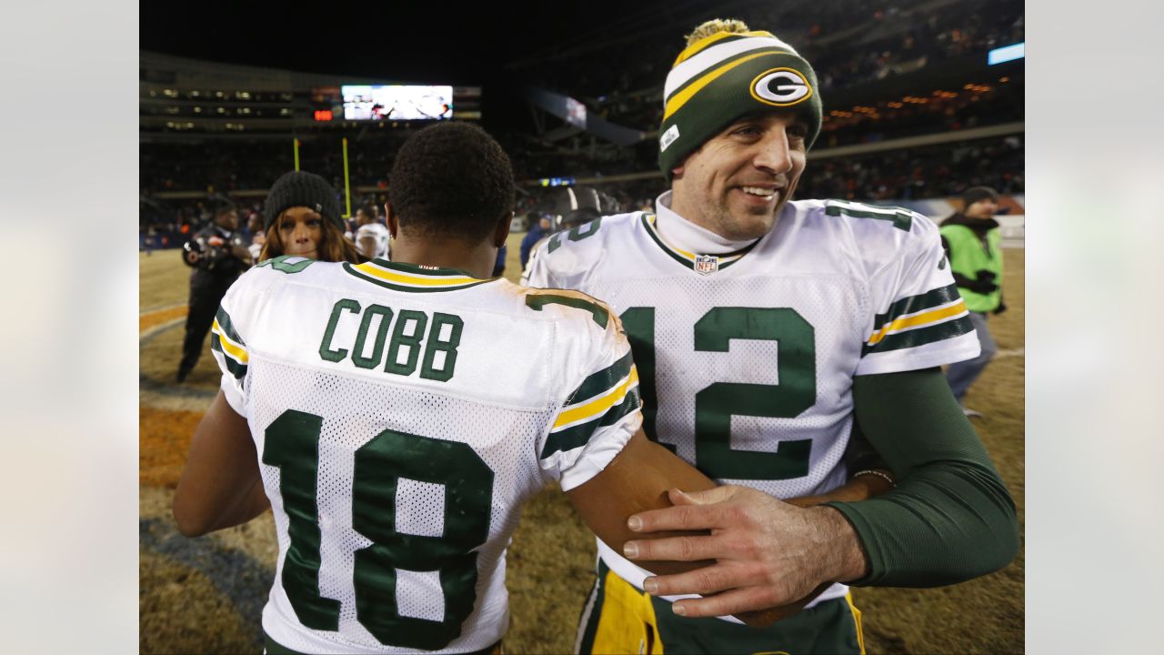 Green Bay Packers receiver Jordy Nelson (87) and quarterback Aaron Rodgers  (12) are all smiles after the two teamed up for a touchdown against the  Chicago Bears in the fourth quarter at