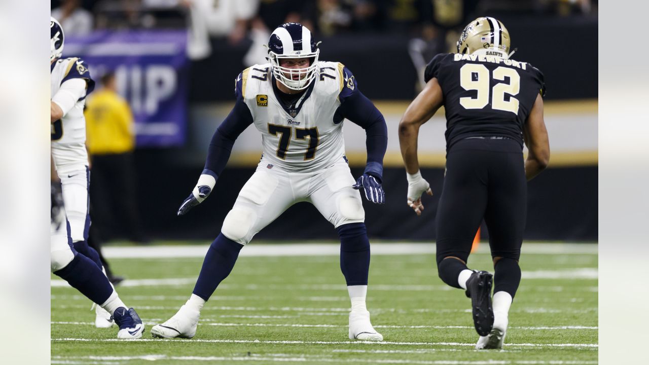 Los Angeles Rams offensive tackle Andrew Whitworth (77) walks back