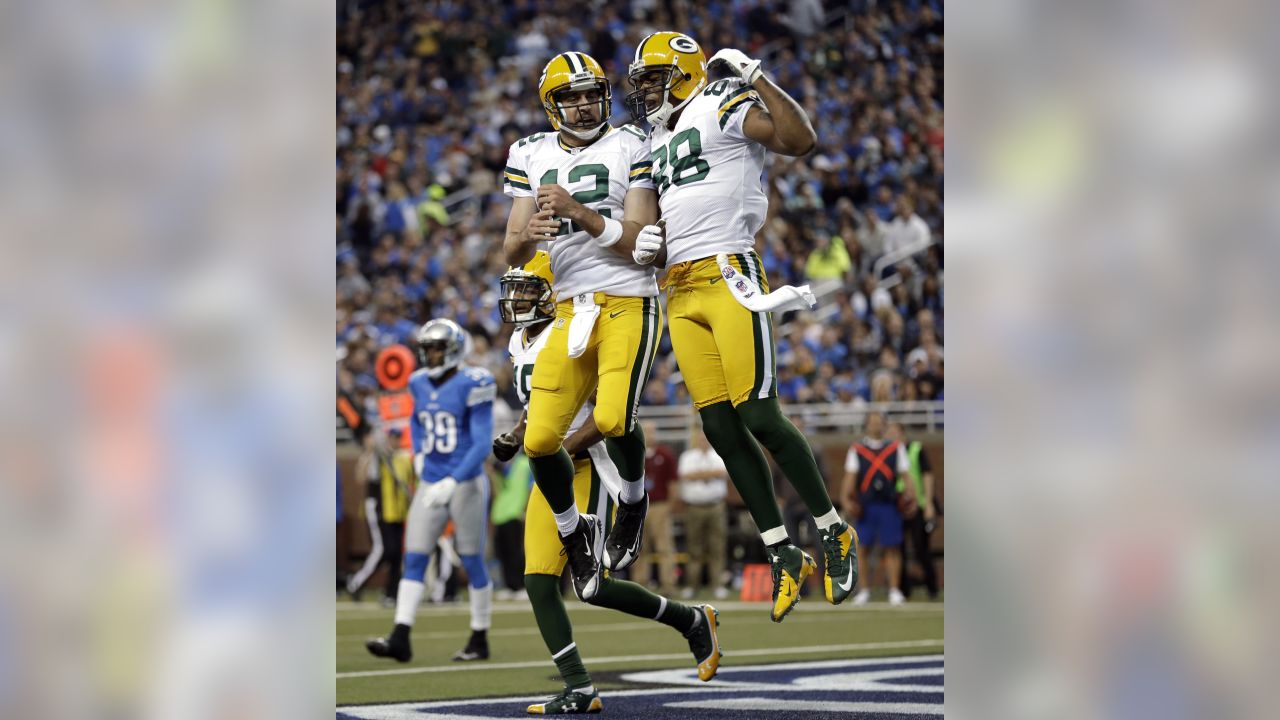 Green Bay Packers Jermichael Finley celebrates with Aaron Rodgers after he  catches an 12 yard touchdown pass in the first quarter against the New York  Giants in week 13 of the NFL