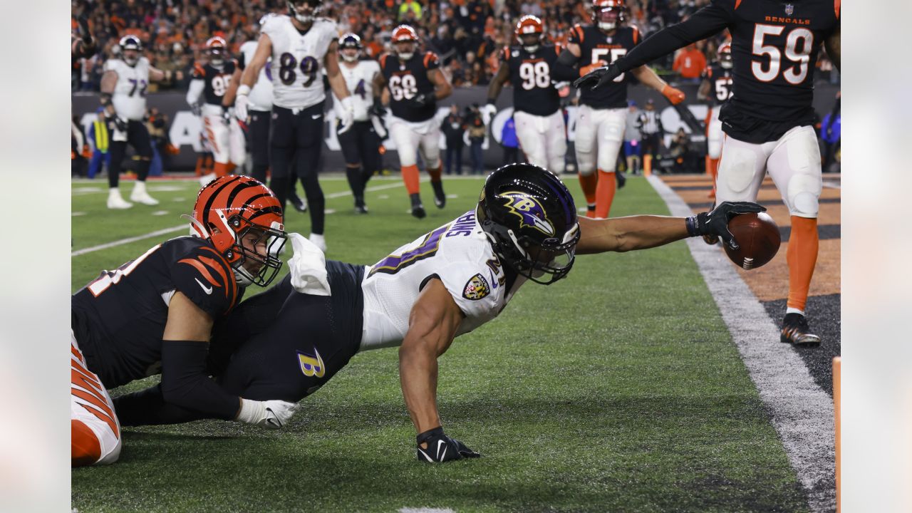 CINCINNATI, OH - JANUARY 08: Cincinnati Bengals tight end Hayden Hurst (88)  dives for a first down in a game between the Baltimore Ravens and the  Cincinnati Bengals on January 8, 2023