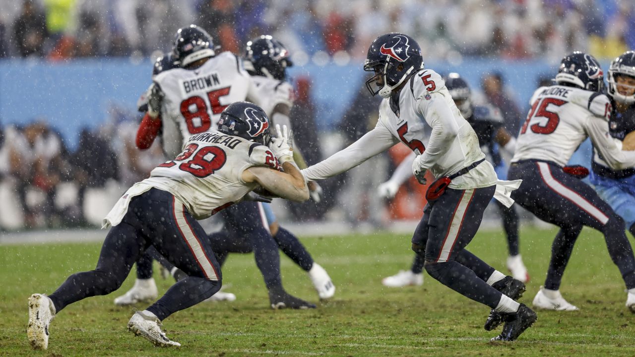 Houston Texans running back Rex Burkhead (28) warms up before an