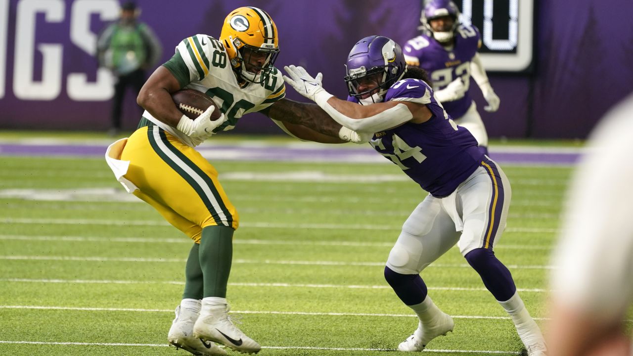 Buffalo Bills wide receiver Stefon Diggs (14) is brought down by Minnesota  Vikings linebacker Eric Kendricks (54) in the first half of an NFL football  game, Sunday, Nov. 13, 2022, in Orchard