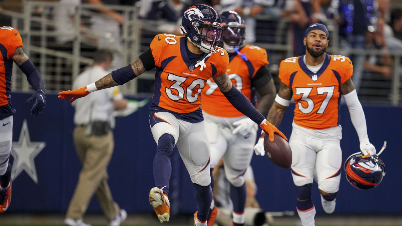 Denver Broncos running back Melvin Gordon (25) and Denver Broncos safety  Caden Sterns (30) prior to