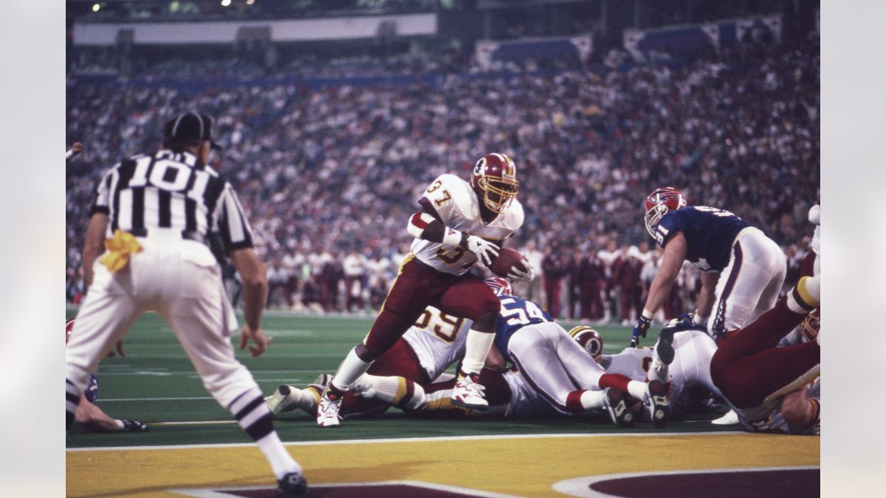 Buffalo Bills running back Thurman Thomas picks up some yardage during the  first quarter of the Super Bowl against the Dallas Cowboys on Sunday, Jan.  30, 1994 at the Georgia Dome in