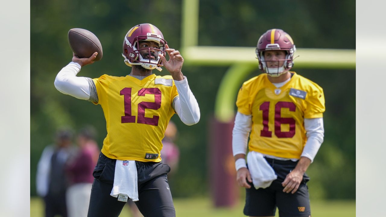 Washington Commanders quarterback Tim DeMorat (16) catches a pass