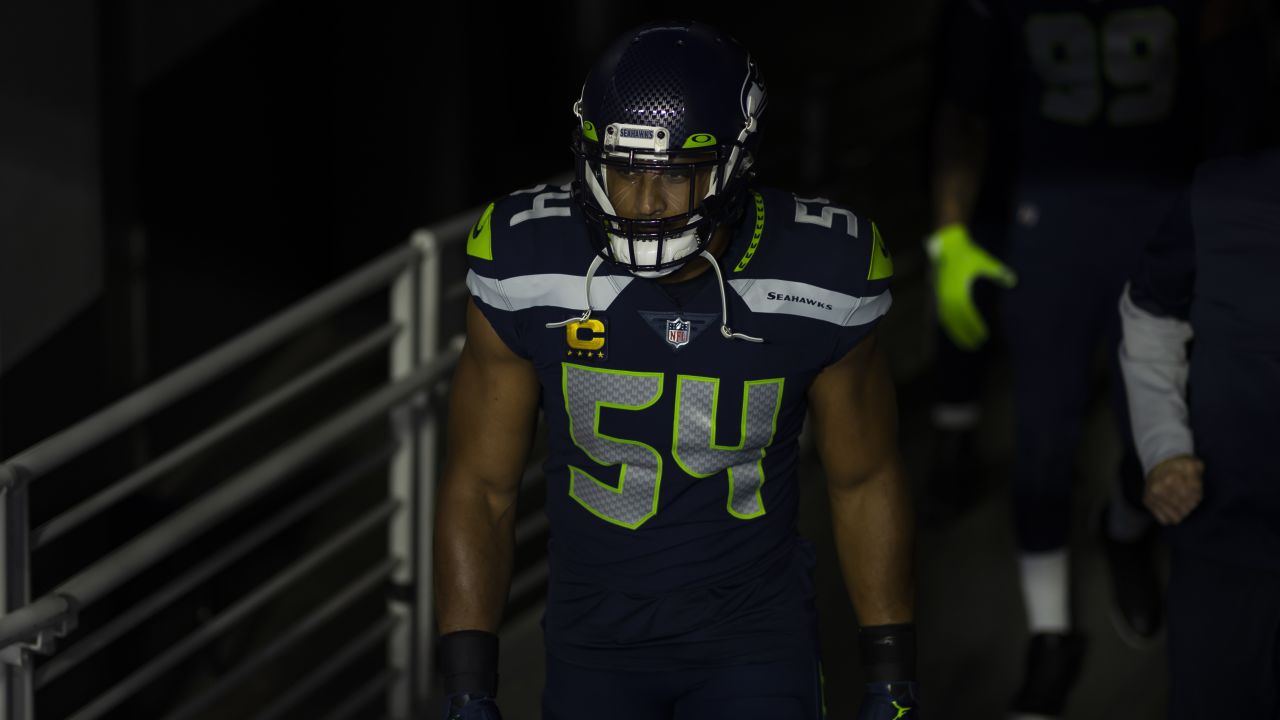 MLB Bobby Wagner runs out of the tunnel during introductions before taking  on the 49ers for the NFC Championship.