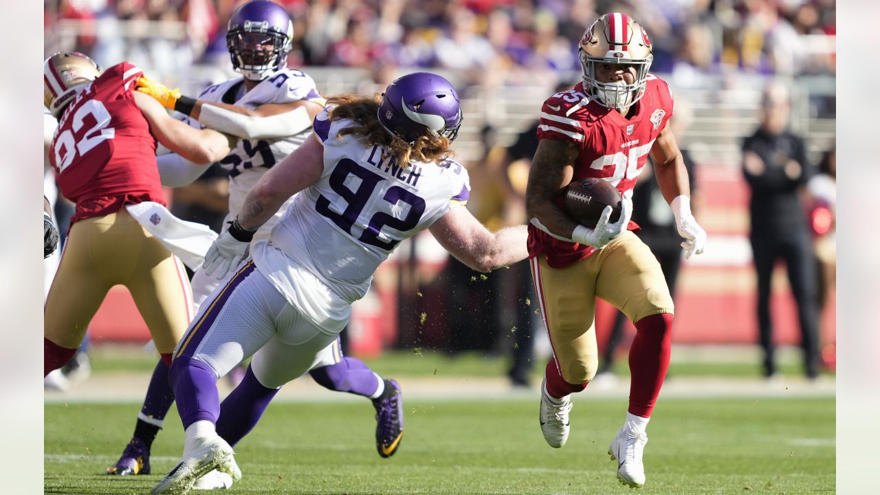 Green Bay Packers wide receiver Equanimeous St. Brown, left, tries to break  a tackle by Minnesota Vikings defensive tackle James Lynch (92) during the  second half of an NFL football game, Sunday