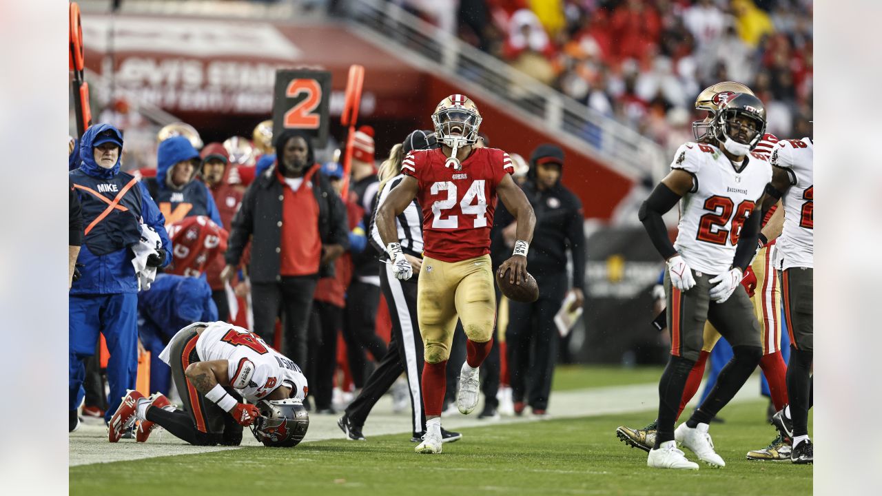 SANTA CLARA, CA - DECEMBER 04: San Francisco 49ers running back Jordan Mason  (24) runs through the