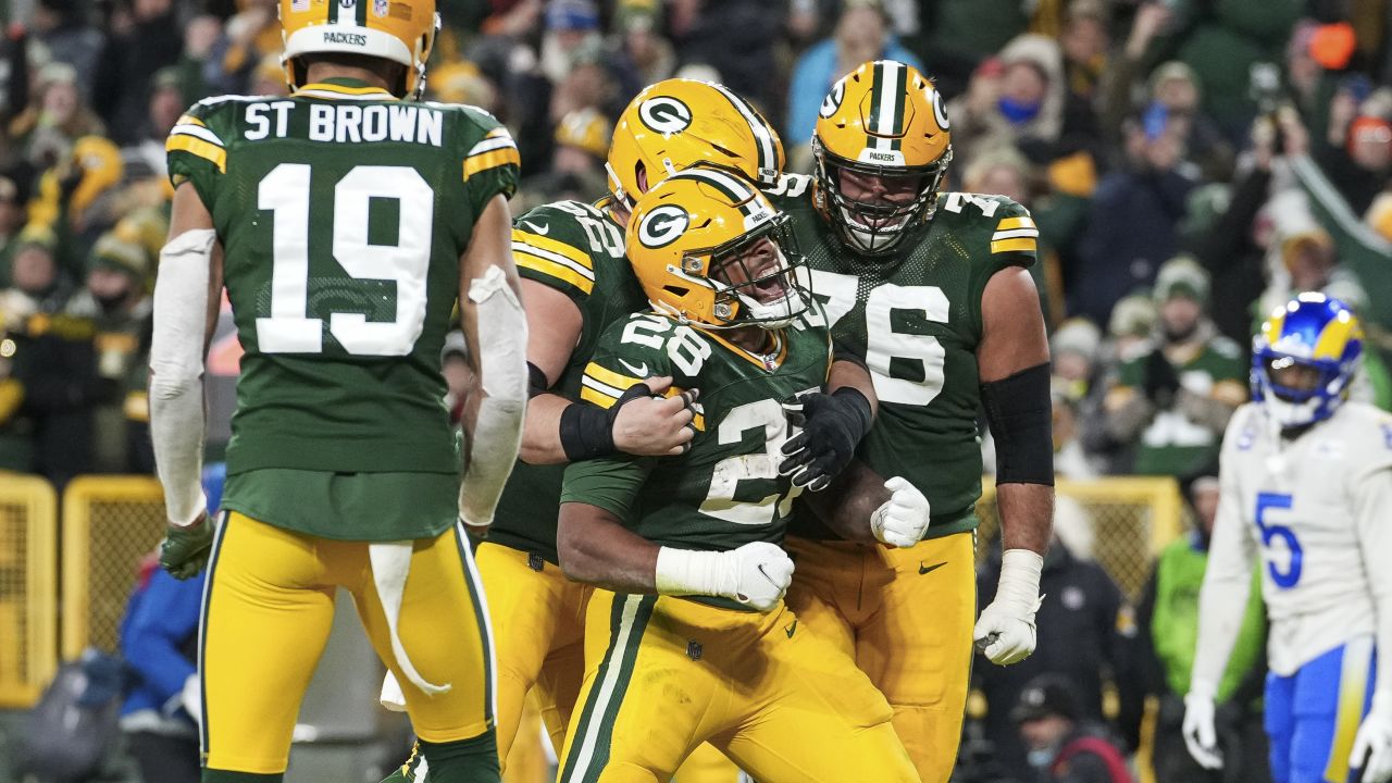 GREEN BAY, WI - NOVEMBER 28: Los Angeles Rams defensive end Aaron Donald  (99) reacts to a play during a game between the Green Bay Packers and the  Los Angeles Rams at