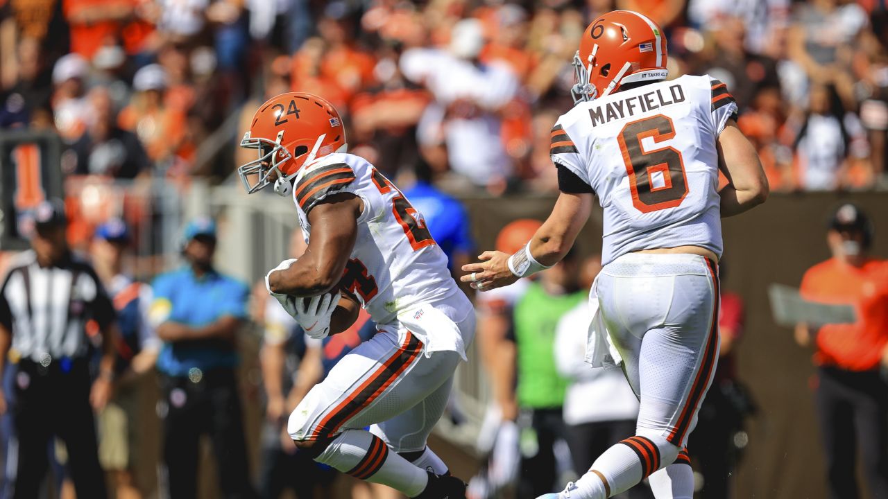 Cleveland Browns running back Nick Chubb (24) and Chicago Bears quarterback  Justin Fields (1) walk on the field after an NFL football game against the  Chicago Bears, Sunday, Sept. 26, 2021, in