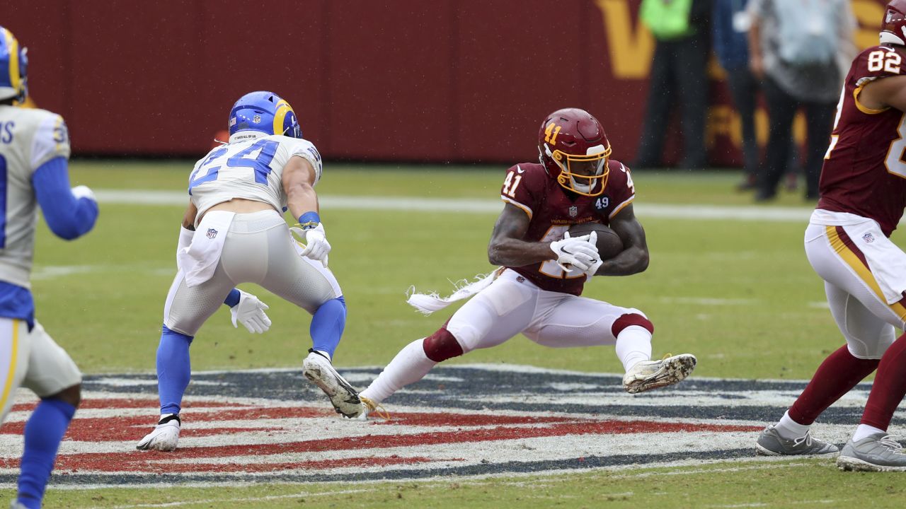 CHICAGO, IL - OCTOBER 13: Washington Commanders running back J.D. McKissic  (23) runs with the football in action during a game between the Chicago  Bears and the Washington Commanders on October 13