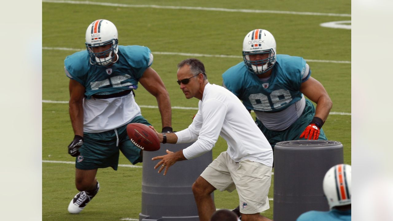 Miami Dolphins quarterback Chad Henne runs drills during NFL