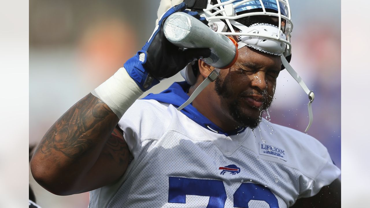 Buffalo Bills offensive tackle Dion Dawkins (73) greets fans after