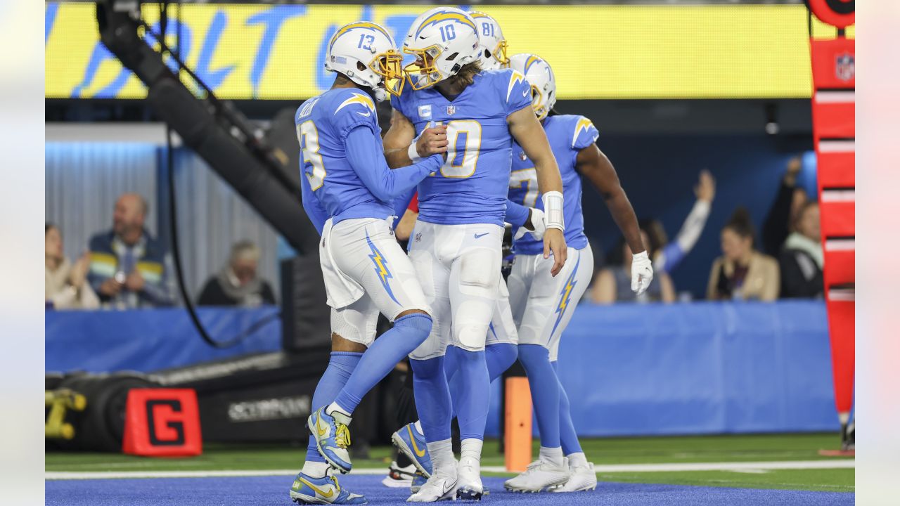 Los Angeles Chargers quarterback Justin Herbert runs with the ball during  the first half of an NFL football game against the Kansas City Chiefs  Thursday, Dec. 16, 2021, in Inglewood, Calif. (AP